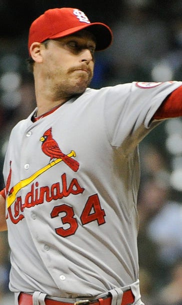 Axford returns to Miller Park a month after trade